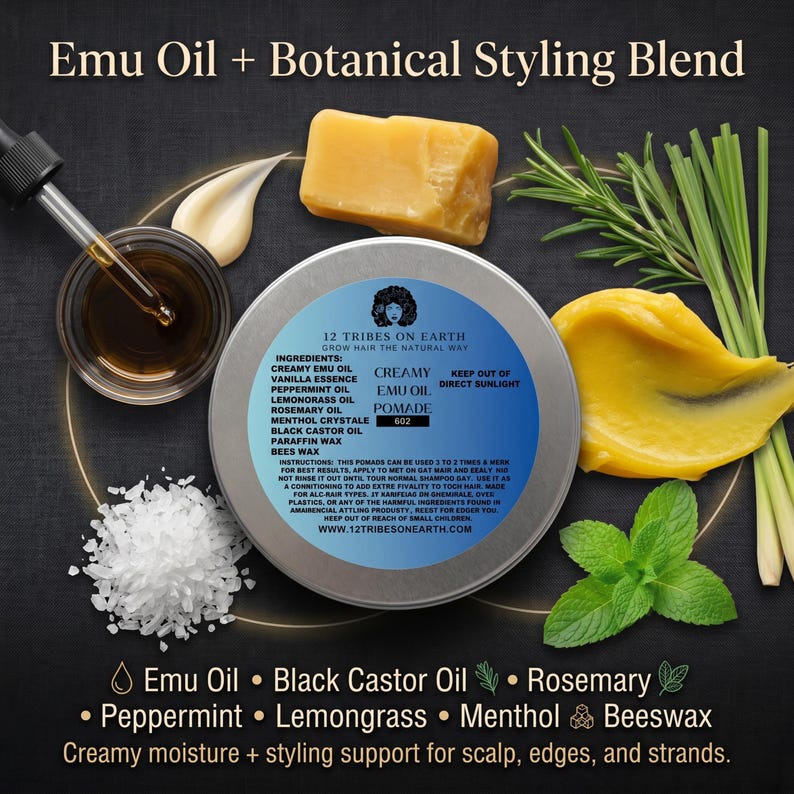 May include: A round metal tin of 12 Tribes on Earth Creamy Emu Oil Pomade surrounded by ingredients including a block of beeswax, a dropper of oil, white salt crystals, fresh rosemary, lemongrass, and mint leaves on a dark textured background.