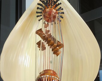 ルビック・ササンド・チューブハープ、インドネシアの透明な電子楽器