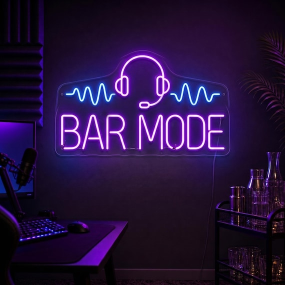 A custom neon sign combining 'BAR MODE' with headphones and sound waves — actually looks like something a teen would beg their parents for in their room or gaming setup.