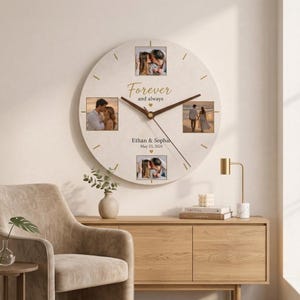 May include: A round wall clock with a light beige face featuring four square photo frames, dark brown hands, and gold text that reads Forever and always, Ethan & Sophie, and May 23, 2025. The clock includes small gold heart icons between the text.