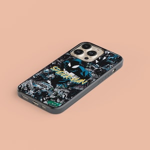 May include: Black phone case with a Spiderman graphic and a collage of comic book panels. The case has a black border and a clear back. The phone case is designed for an iPhone.