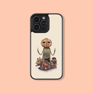 May include: A white iPhone case with a black border and a Halloween-themed design. The design features a jack-o'-lantern with a spooky face and three smaller jack-o'-lanterns with witch hats.