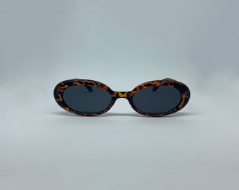 Gafas de sol ovaladas clásicas retro delgadas / Monturas vintage estrechas y alargadas / Protección UV / Tonos unisex en tortuga profunda