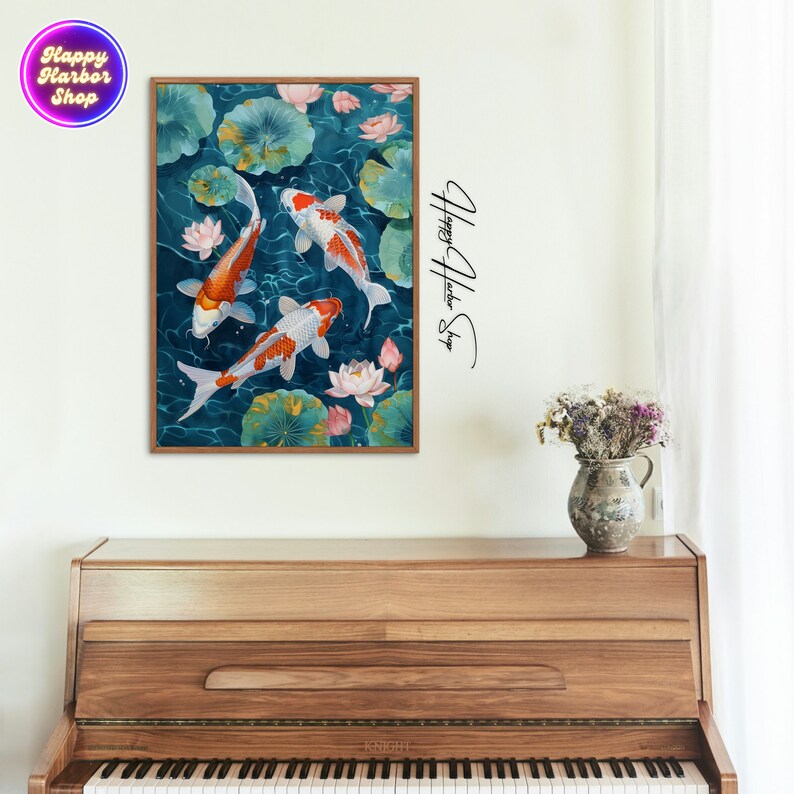 May include: A framed painting of three orange and white koi fish swimming in a blue pond with green lily pads and pink lotus flowers.