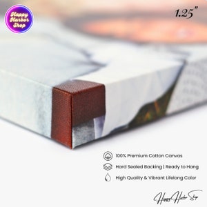 May include: Close-up of a canvas print with a brown wooden frame. The print has a 1.25 inch depth. The canvas is 100% premium cotton, has a hard sealed backing, and is ready to hang. The print features high quality and vibrant lifelong color.