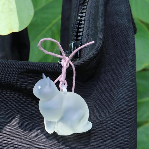 clear + chunky lucky “ghost” cat bag charm with embellished cubic zirconia eyes