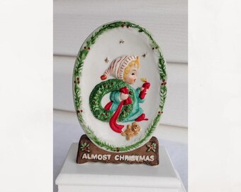 1978 Precious moments bisque porcelain Christmas cameo figurine.  'Almost Christmas " . Christmas decoration.  Holiday Collectable.  Enesco.