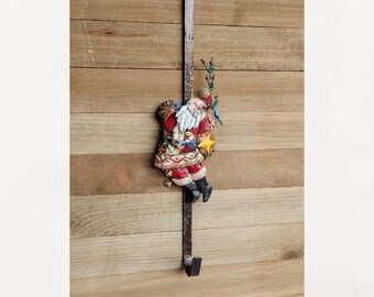 Vintage metal primitive Santa Clause wreath hanger.  Over the door Santa wreath holder.