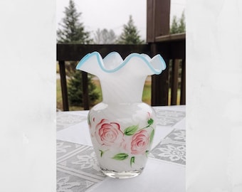 Vintage Fenton glass art vase. White opalescent glass. Optic swirl pattern. Aqua blue ruffled rim. Hand painted roses. 6" tall.