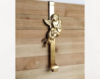Vintage gold metal guardian angel over the door wreath hanger.  Angel door hanger for wreath.  Christmas decoration.  Cherub hanger hook.