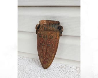 Antique pottery Japanese wall pocket vase.  Floral accented.