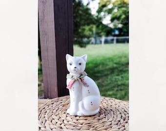 Vintage sitting cat figure.  Pink white ceramic floral cat.  Fabric bow.  1989 Summit Corp.   Vintage white cat statue.  8.25" tall.