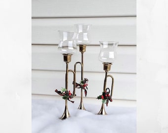 Vintage brass bugle votive Christmas candle holders.  Holly and berry adornments. Christmas around the world. Mcm holiday candle holders.