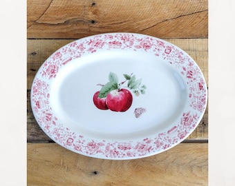 Vintage Pfaltzgraff 12" oval platter.  Delicious dinnerware serving platter.  Apple accented with floral border.