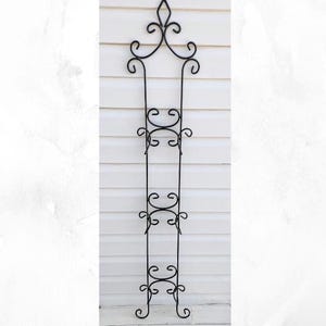 Vintage 3 tier wall mount plate display rack.  Vertical wall mount plate rack.  Pewter color. Metal plate rack.  Plate holder wall. 48&quot; long
