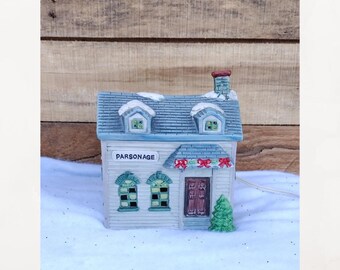 Vintage Christmas village lighted porcelain patronage. 1991 Americana Collectable.  Hand painted patronage. illuminated Christmas decor.