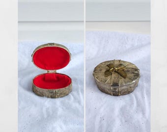 Vintage goldinger silver plated Hindged trinket /jewelry box with bow. Red velvet lining.  Ornate jewelry storage box.  5" X 3.75" X 2