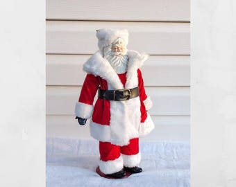 Vintage Christmas around the world porcelain Santa Claus doll figure with stand.  Christmas decoration. St. Nick figure.  15" tall