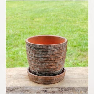 Vintage Urban jungle textured terracotta pottery planter with attached saucer. Naturally weathered.   4.5 X 4.5".  Rustic pottery planter.