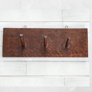 Vintage wooden Rustic coat/hat hanger.  Wall mount coat rack.  3 pegs.