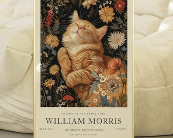 May include: A framed art print featuring a ginger cat nestled among colorful flowers. The cat is depicted with its eyes closed, appearing relaxed. The print includes text that reads "WILLIAM MORRIS" and "COTTON PRINTS EXHIBITION". The artwork is set against a dark background.
