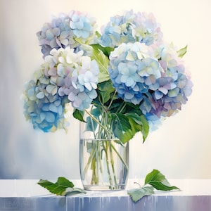 May include: A bouquet of blue and purple hydrangeas in a clear glass vase. The flowers are arranged in a loose, natural style, and the vase is sitting on a white surface.