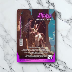 May include: A trading card featuring Atraxa, Grand Unifier, a Phyrexian Angel. The card has a purple border and depicts a winged figure seated on a throne. Text includes card abilities and artist information.