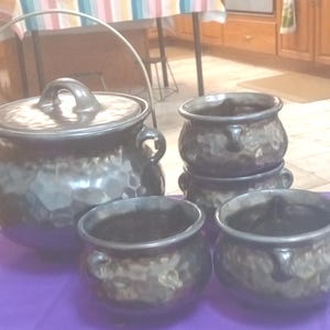 1950's, bean pot and 4 bowls, footed, lid and handle, hammered copper design, partial original label in lid