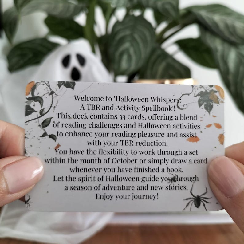 A set of small cards, each beautifully designed with Halloween-themed imagery, and titled: Halloween Whispers- A TBR and Activity Spellbook. In the colors orange, black and brown. The cards offer 27 reading prompts and 6 activities.