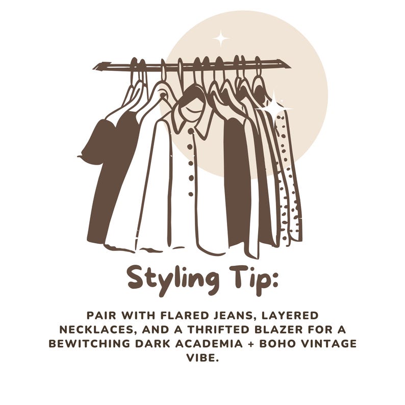May include: A line of clothing hanging on a rack, including a white button-down shirt, a black t-shirt, and a striped shirt. The text "Styling Tip: PAIR WITH FLARED JEANS, LAYERED NECKLACES, AND A THRIFTED BLAZER FOR A BEWITCHING DARK ACADEMIA + BOHO VINTAGE VIBE." is below the rack.