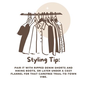 May include: A line of clothing hanging on a rack with a brown background. The text "Styling Tip: PAIR IT WITH RIPPED DENIM SHORTS AND HIKING BOOTS, OR LAYER UNDER A COZY FLANNEL FOR THAT CAREFREE TRAIL-TO-TOWN VIBE." is below the image.