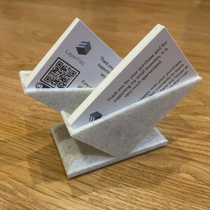 Distributeur de présentoir pour porte-cartes de visite