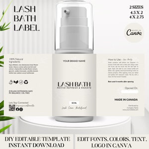 May include: White label template for lash bath product with the text "Lash Bath" and "Revive Refresh & Radiate" in a black font. The label also includes the text "100% Natural Ingredients", "Eyelash Extension Safe", "PH Balance | Oil Free", "50 ml", "Lash Care. Redefined", "How to Use", "Best used 6 months after opening", "Opened On", "Made in Canada", "Distributed by Company Name", "www.yourwebsite.com", "DIY Editable Template", "Instant Download", "Edit Fonts, Colors, Text, Logo in Canva", and "2 Sizes 4.5 X 2 4 X 2.75" in black font. The label also includes a QR code and social media icons.
