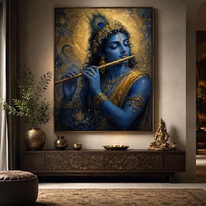 May include: A rectangular wall art print depicting a blue-skinned deity playing a golden flute. The figure wears ornate gold jewelry, a peacock feather in their hair, and is set against a textured gold and blue background with a circular halo.