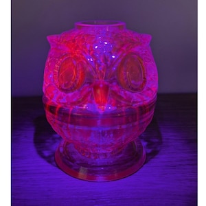 May include: A set of three ceramic mugs with a speckled, matte finish. The mugs are in shades of cream, light gray, and dark gray. Each mug has a simple, minimalist design, perfect for coffee or tea.