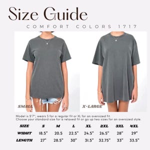 May include: Size guide for Comfort Colors 1717 t-shirts. The image shows two models wearing gray t-shirts, one in a small and the other in an X-large. The guide provides measurements for width and length in inches for sizes S through 4XL. The text also mentions the model's height and fit suggestions.