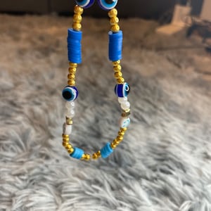 Evil eye phone charm