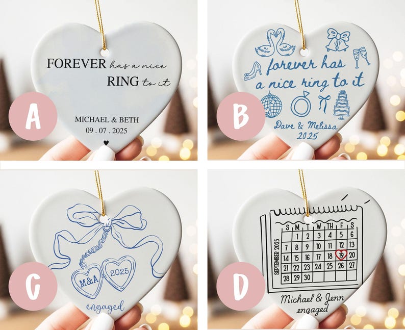 May include: Heart-shaped ceramic ornaments with gold string for hanging. Each ornament features a different design and text in black or blue, including phrases like "Forever has a nice ring to it" and names with dates. Ideal for engagement or wedding gifts.