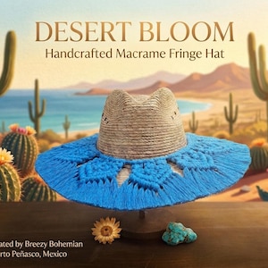 May include: A wide-brimmed hat with a natural tan woven crown and a vibrant blue macrame fringe brim featuring intricate knotted patterns. The text DESERT BLOOM Handcrafted Macrame Fringe Hat is visible above the hat, with Created by Breezy Bohemian Puerto Peñasco, Mexico below.
