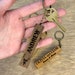 see more listings in the Key Chain section