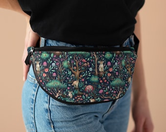 May include: A black fanny pack with a colorful floral pattern featuring small animals and mushrooms. The fanny pack is worn around the waist of a person wearing blue jeans.