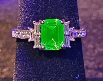 Uranium Glass Ring size 4.5 through 10.5 in Sterling Silver with a vintage Emerald cut Uranium glass stone that glows under black / UV light