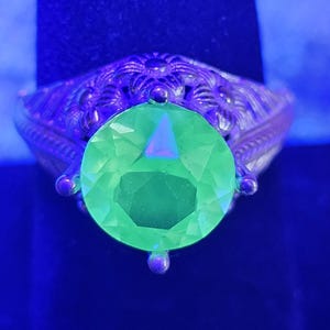 Uranium Glass Round cut Ring in size 7. Vintage style new Sterling Silver with a vintage Uranium glass stone that glows under black/UV light