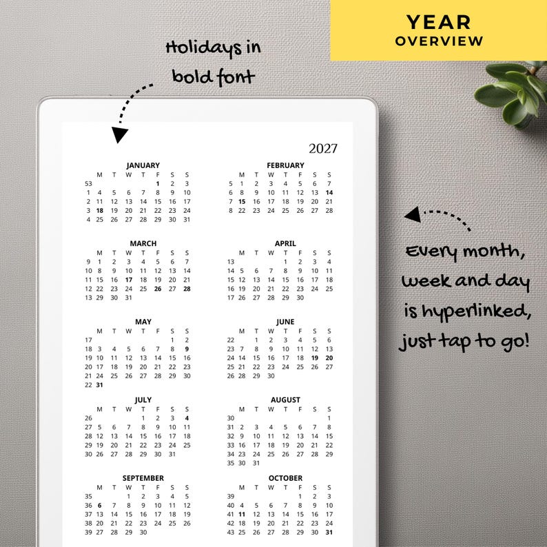 May include: A digital 2027 year overview calendar displayed on a tablet screen. The calendar features months from January to October with dates arranged in a grid. Text includes 'YEAR OVERVIEW', 'holidays in bold font', and 'Every month, week and day is hyperlinked, just tap to go!'