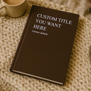 May include: A brown book with the text "CUSTOM TITLE YOU WANT HERE" and "Custom Subtitle" sits on a cream-colored knitted blanket. A cup of coffee, an open book, and a lit candle are also in the image, creating a cozy atmosphere.