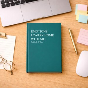 May include: A teal book titled "EMOTIONS I CARRY HOME WITH ME" by Emily Wilson, lies on a wooden desk. A laptop, notepad, glasses, pen, sticky notes, and a mouse are also on the desk. The book's cover is a solid teal color.