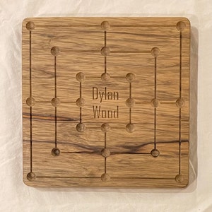 Wood Nine Men Morris game board, customized with name engraving and finished with clear lacquer.