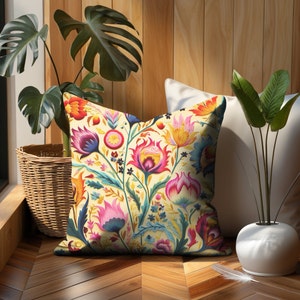 colorful boho hippie floral home decor throw pillow covers unique home decor housewarming gift eclectic maximalist floral accent pillow cushion covers for home or bedroom yellow background bright pink, purple, green, yellow, orange flowers