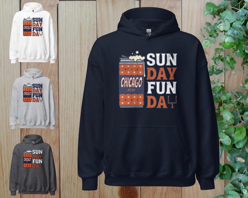 May include: A navy blue hoodie with the text "SUN DAY FUN DAY CHICAGO 1920" in white and orange. The design includes a beer can graphic. Additional hoodies in white, gray, and charcoal are also shown.