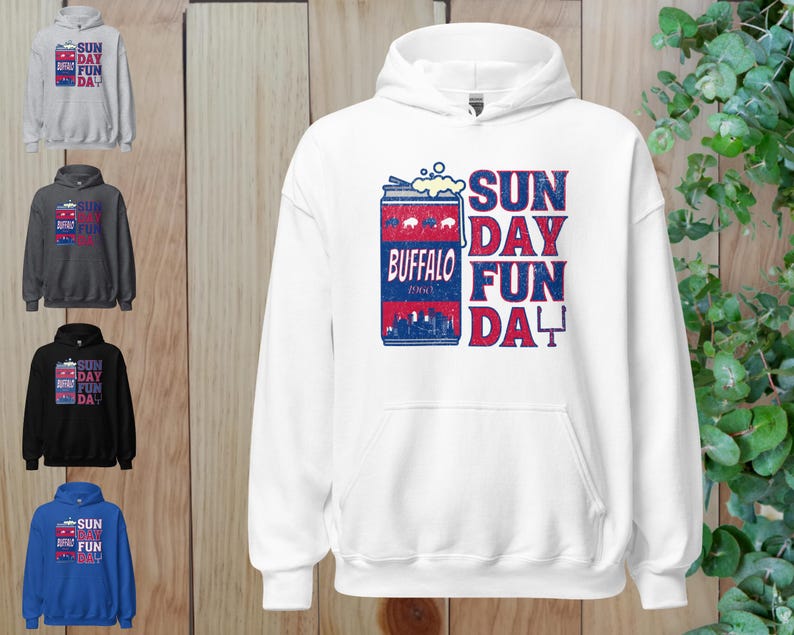 May include: White hooded sweatshirt with a blue and red graphic of a can of Buffalo beer with the text "Sun Day Fun Da" printed on the front.